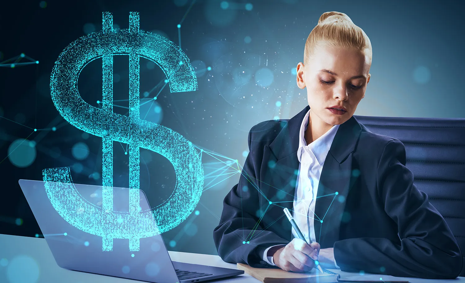 Woman sitting at a desk laking notes